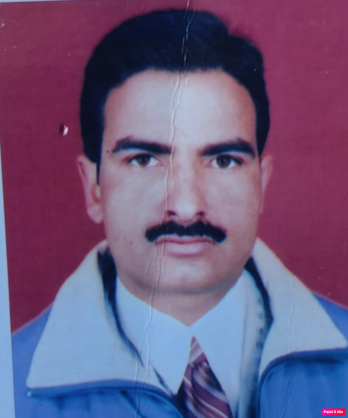 Dr. Shams Din Angher